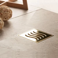 Душевой трап Pestan Confluo Standard Tide Mask Gold Vertical 13000163 144x144/50 мм, с решеткой, перфорированный, золотой